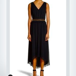 St. John Couture caviar dress with hand beads.